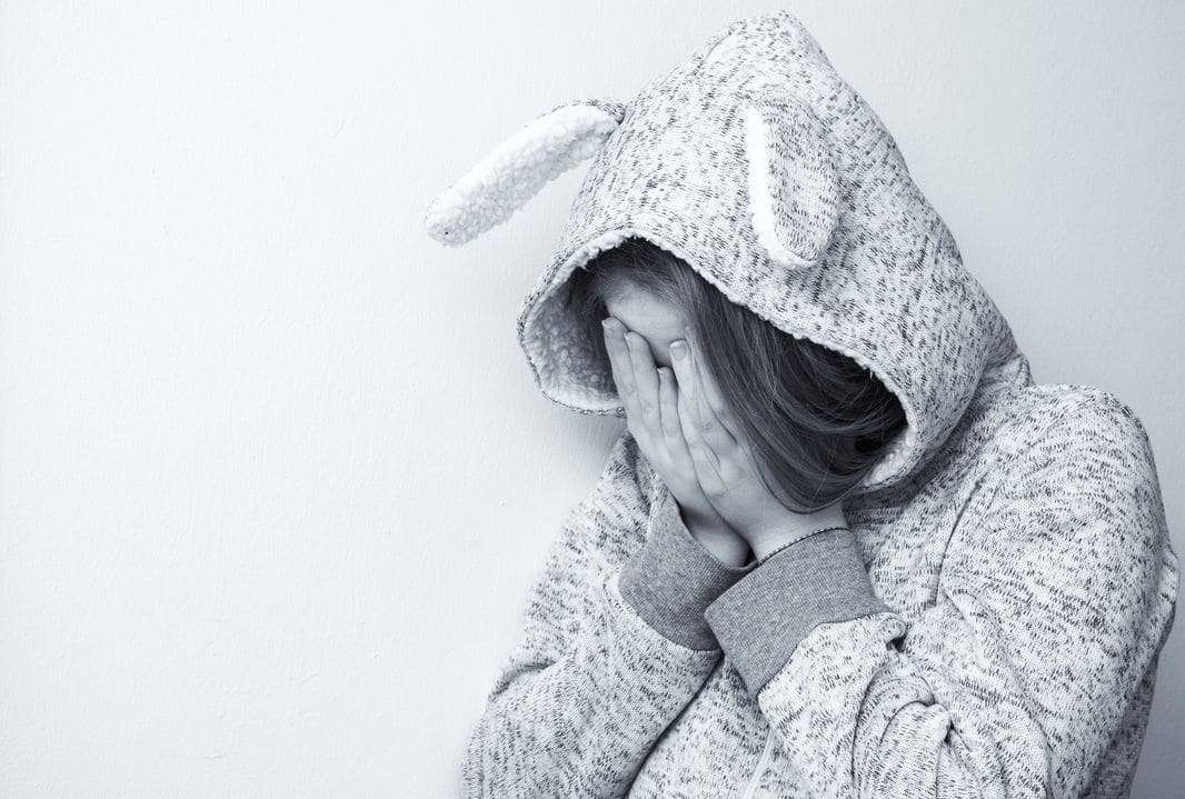 Sad Woman Crying on White Background