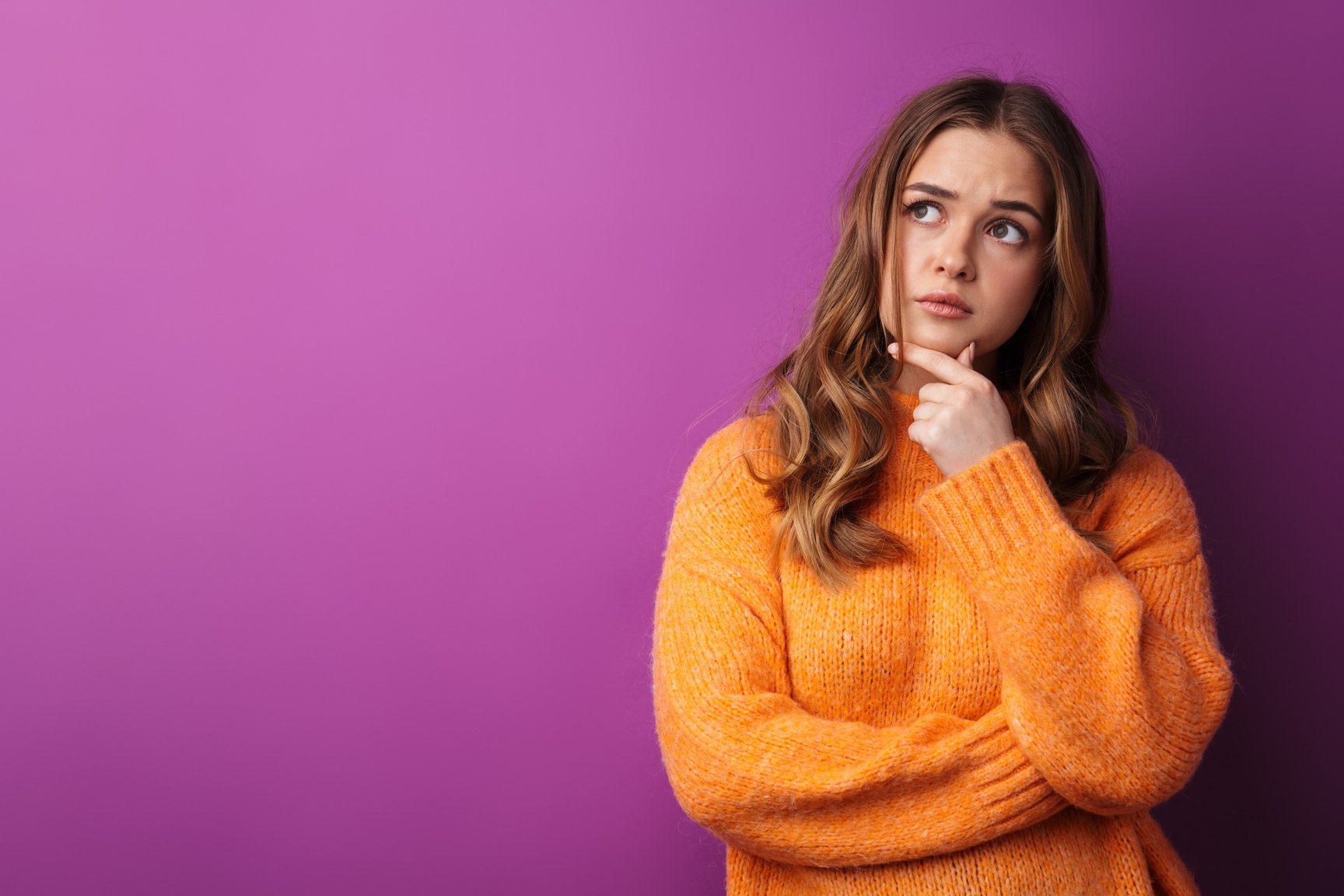 Portrait of a Lovely Young Girl Wearing Sweater Standing Isolated